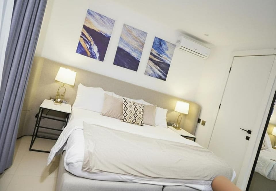 Economy Room, Balcony, City View | In-room safe, desk, laptop workspace, blackout drapes
