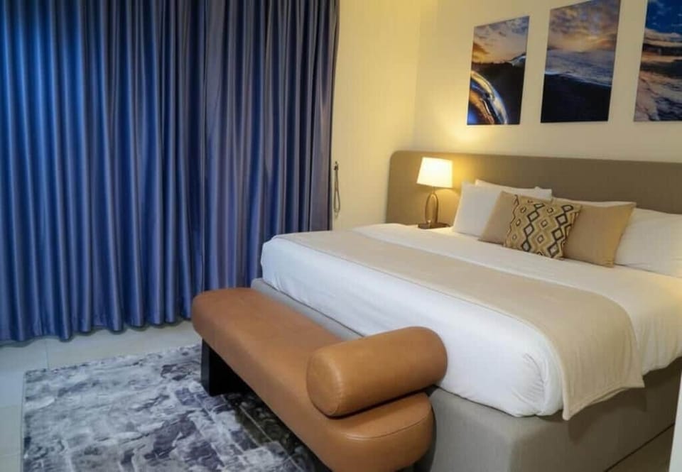 Economy Room, Balcony, City View | In-room safe, desk, laptop workspace, blackout drapes
