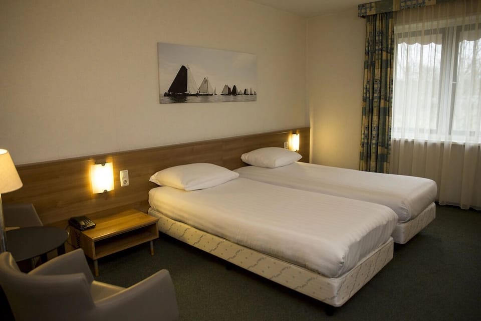 Settle into crisp twin beds for a restful night.