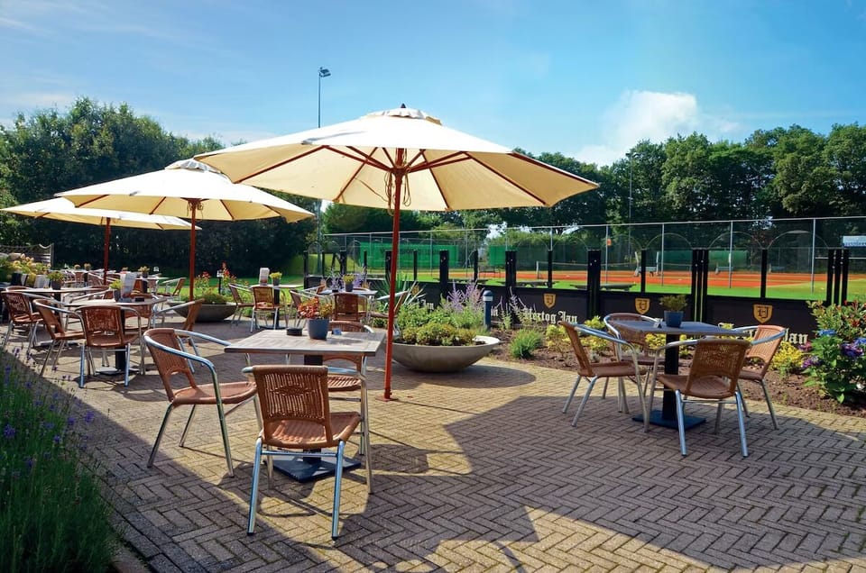 Unwind in the sunshine with drinks on the spacious terrace.