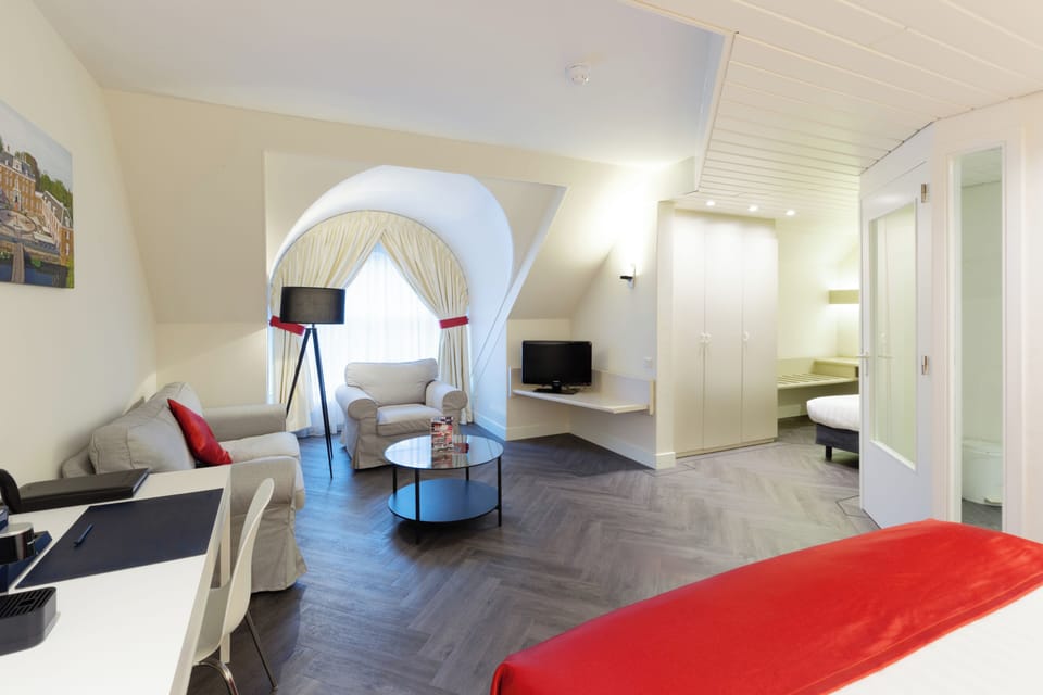 Spread out comfortably with a cozy sitting nook and airy light.