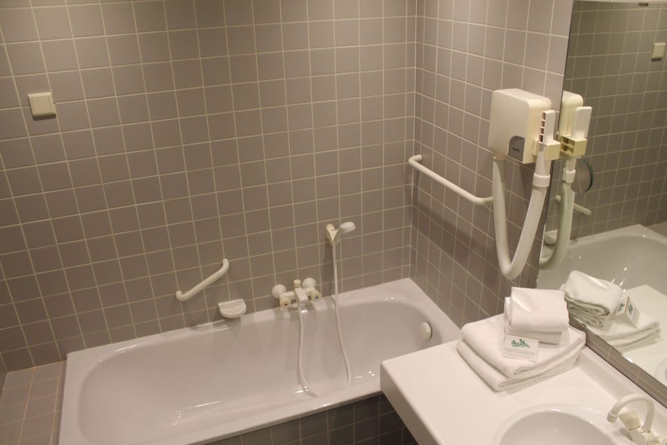 Soak and relax in a deep tub with towels ready.