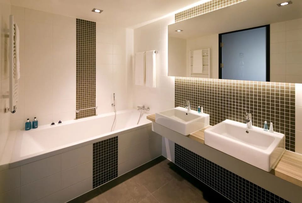Unwind with a deep soak in this sleek spa bath.