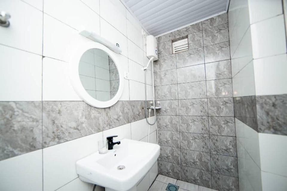 Studio, Balcony, Courtyard View | Bathroom | Shower, slippers, towels, soap