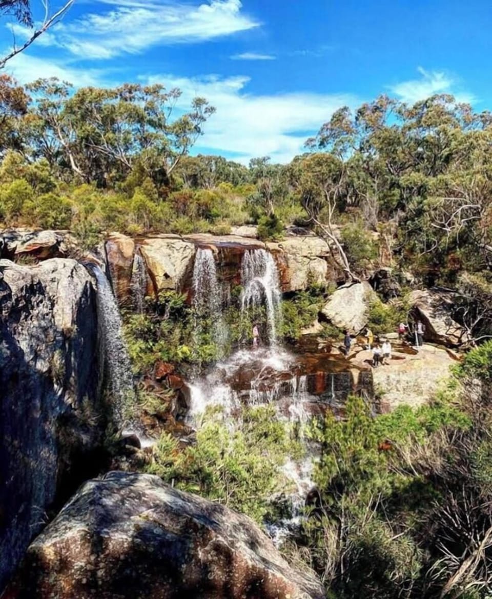 Take a short drive inland to discover this hidden waterfall, where cascading rock pools and native bush set the scene for a refreshing escape.