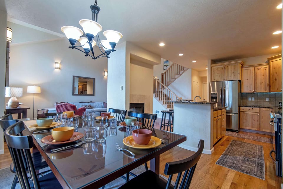 Gather for dinner in this warm, open dining space with chef-ready kitchen nearby