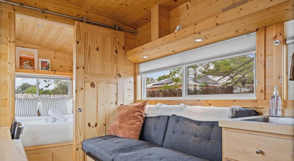 This thoughtfully designed tiny home makes every square foot feel inviting, functional, and full of charm.
