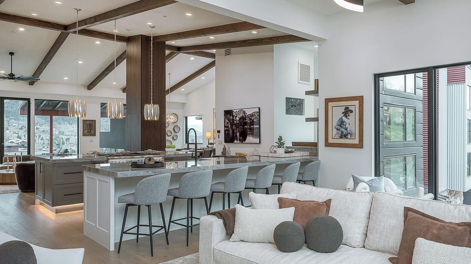 Family Room, Upper Level - Seating area with kitchen island and bar seating