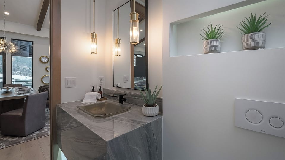 Powder Room, Main Level - Bathroom with single vanity and mirror