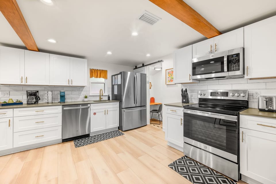 The spacious kitchen is equipped with all the equipment to make a family meal after exploring our historic city.