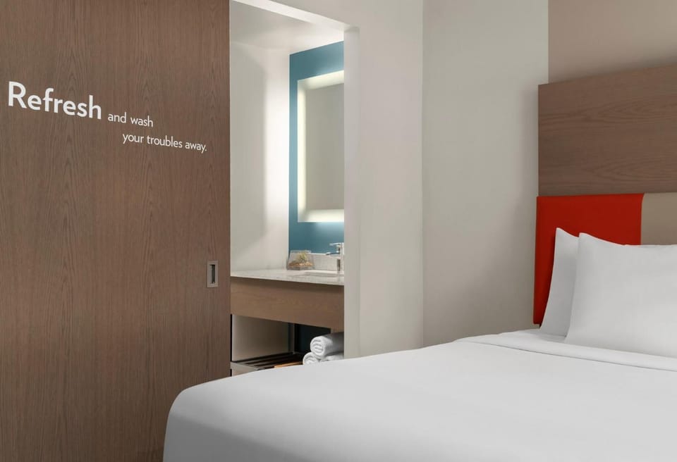 Relax into a calm sleep space with streamlined finishes.
