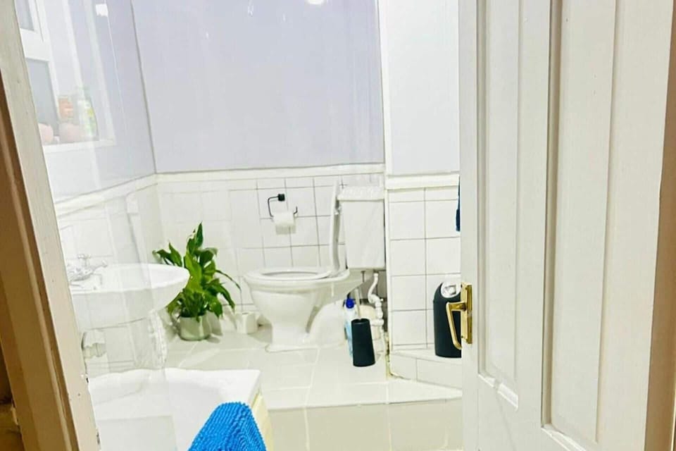 Combined shower/tub, deep soaking tub