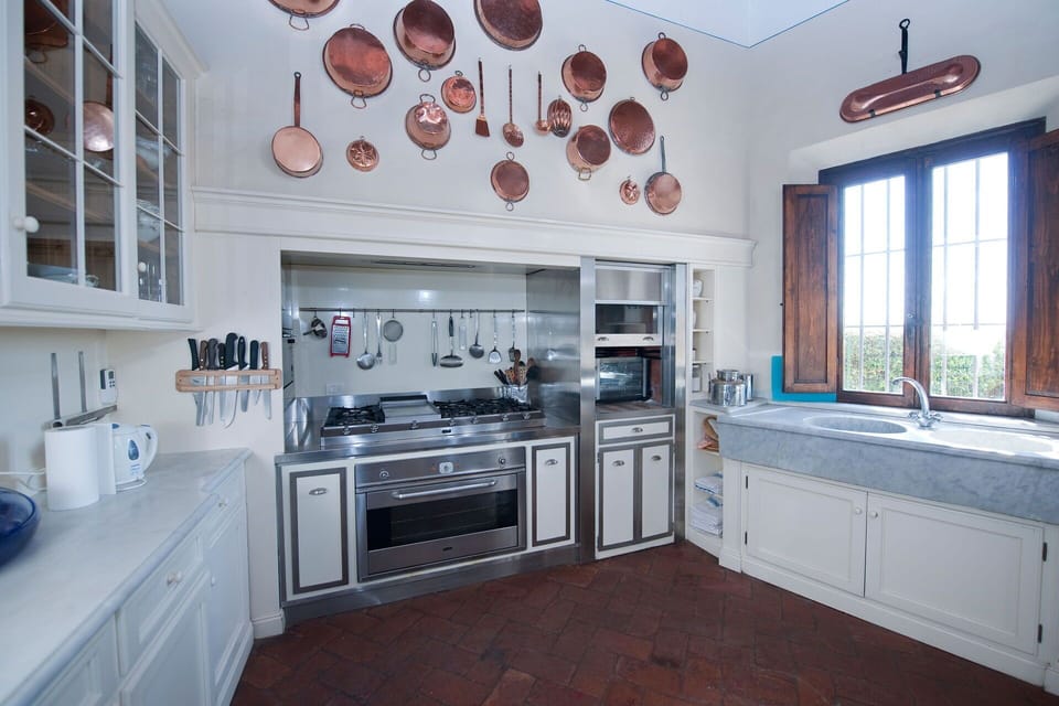 Kitchen, Interior Design, Countertop, Kitchen Stove, Kitchen Appliance, Cabinetry, Major Appliance, Furniture, Ceiling, Gas Stove
