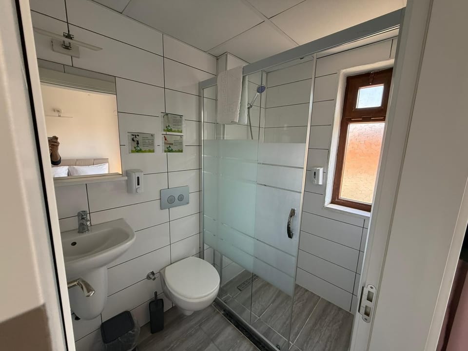 Room, Balcony, City View | Bathroom | Shower, hair dryer, slippers, towels