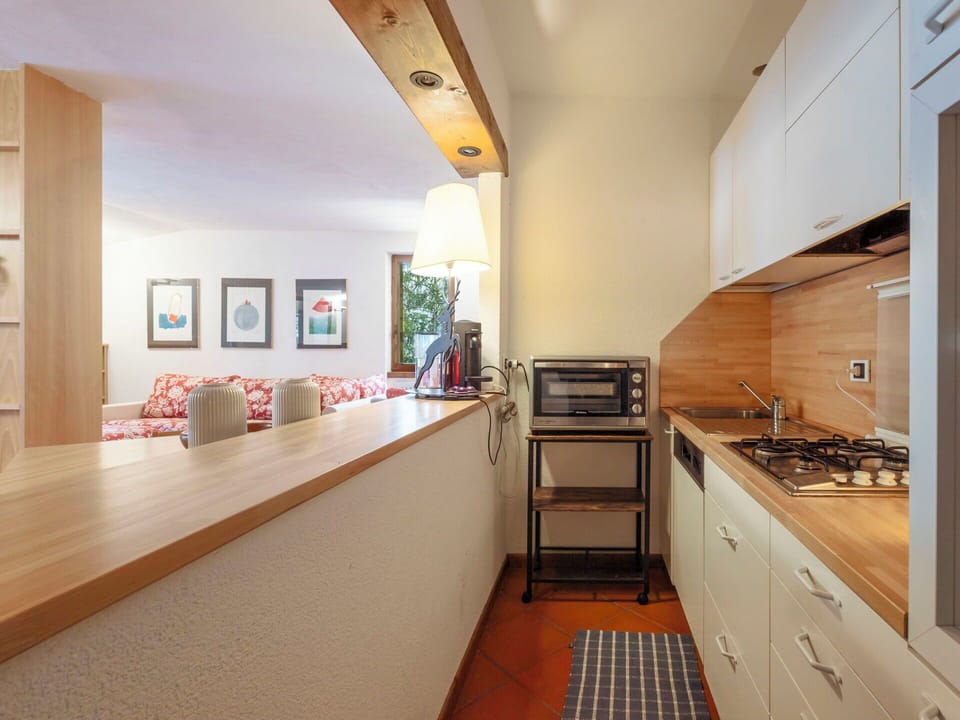 Furniture, Interior Design, Kitchen, Flooring, Countertop, Wood, Floor, Ceiling, Kitchen Appliance, Room