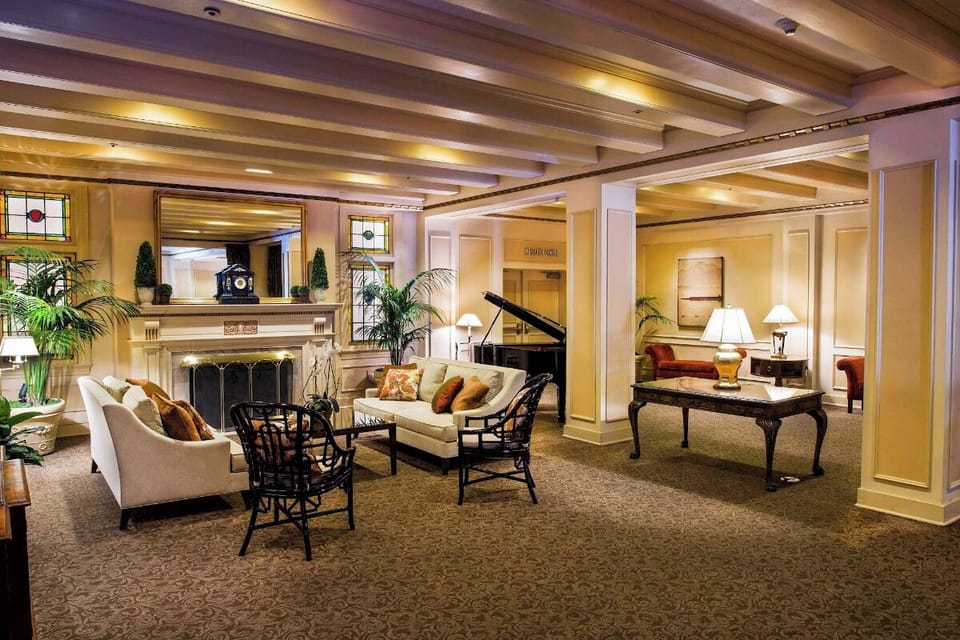 Unwind by the fireplace in a warm, elegant lounge.