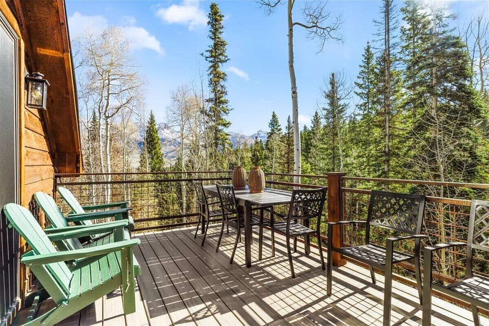  Deck: Outdoor dining area with seating for 8, mountain views

