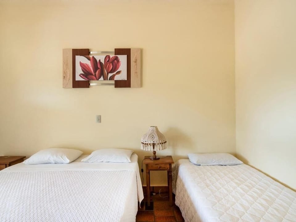 Standard Triple Room, Garden View | Minibar, desk, free WiFi