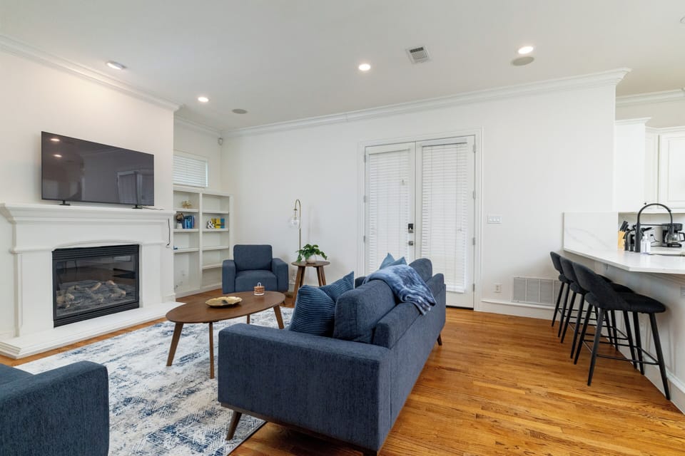 Bright, open-concept layout connecting the living and kitchen areas.
