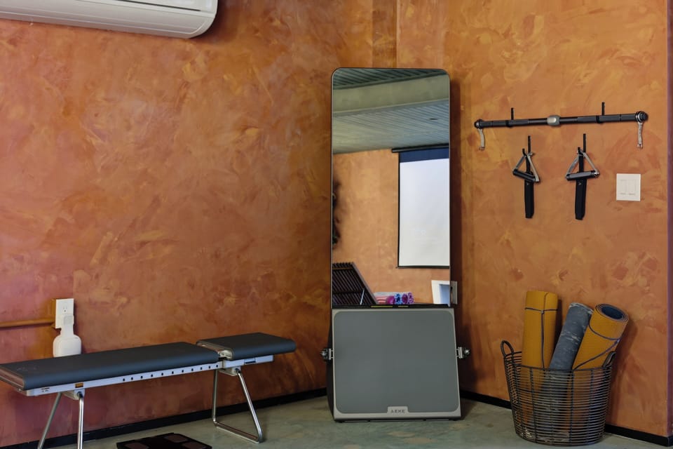 Keep up your routine with this cozy in-home workout area.