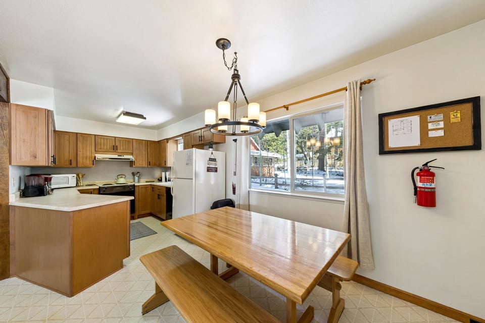 Bright, open kitchen and dining area with garden views