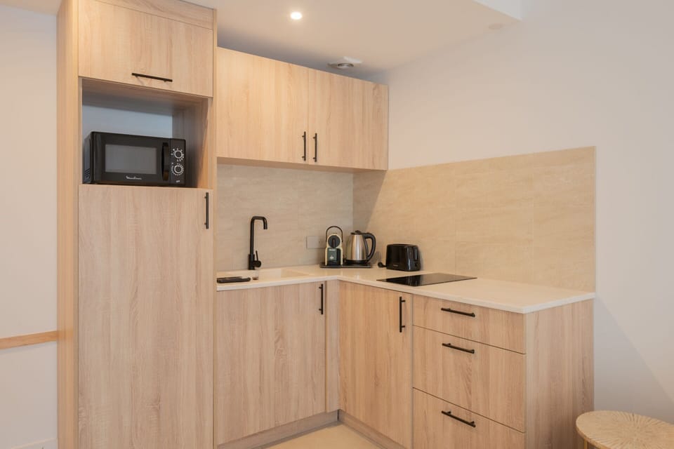 Apartment | Private kitchen | Fridge, microwave, stovetop, coffee/tea maker