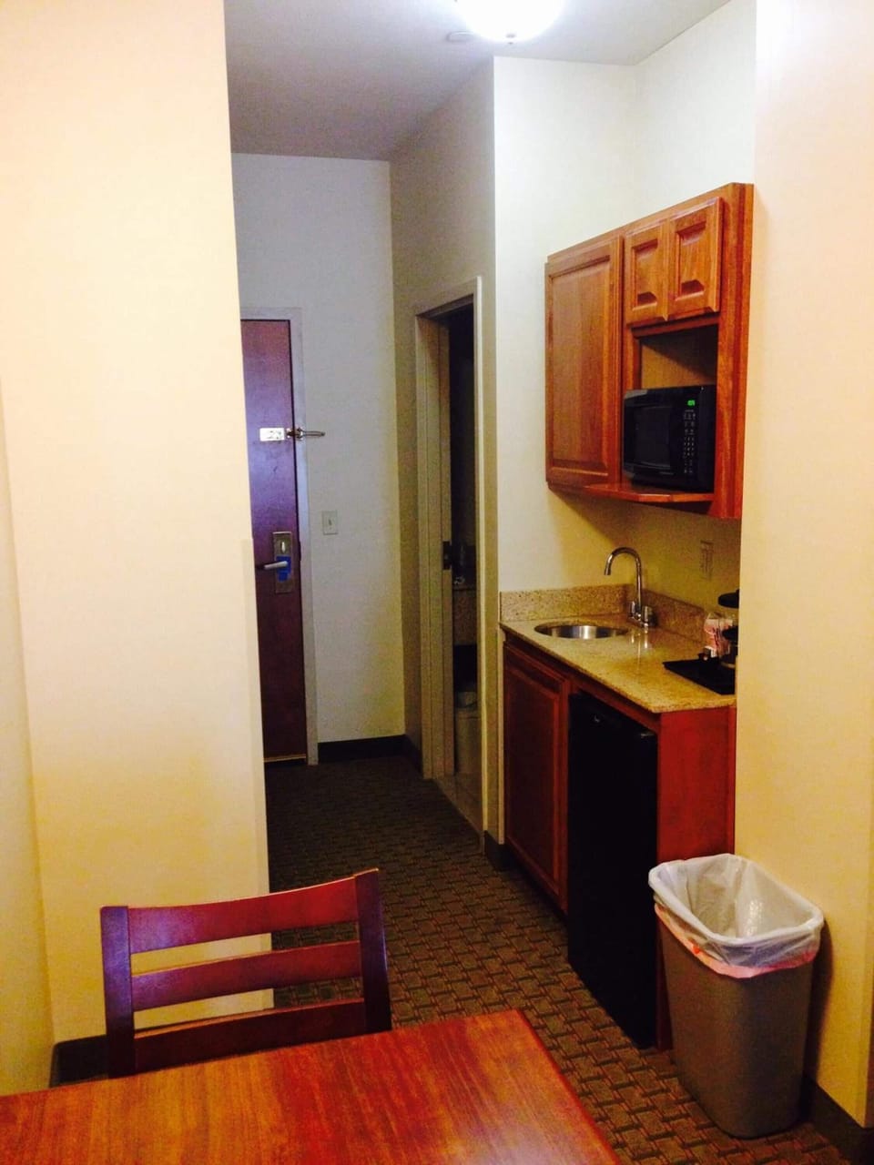 Fridge, microwave, coffee/tea maker, cookware/dishes/utensils