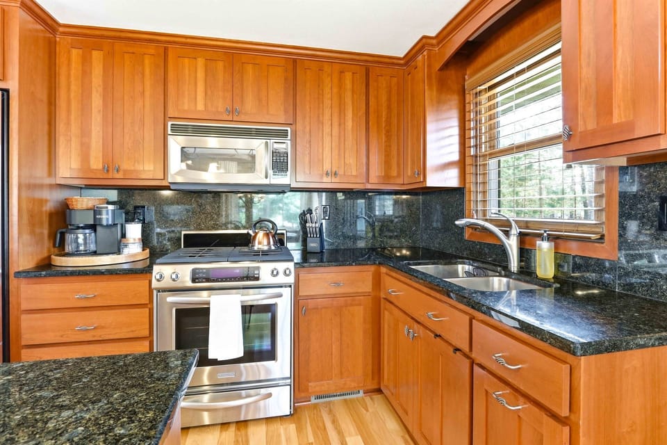 Functional kitchen and dining setup for convenient stays.