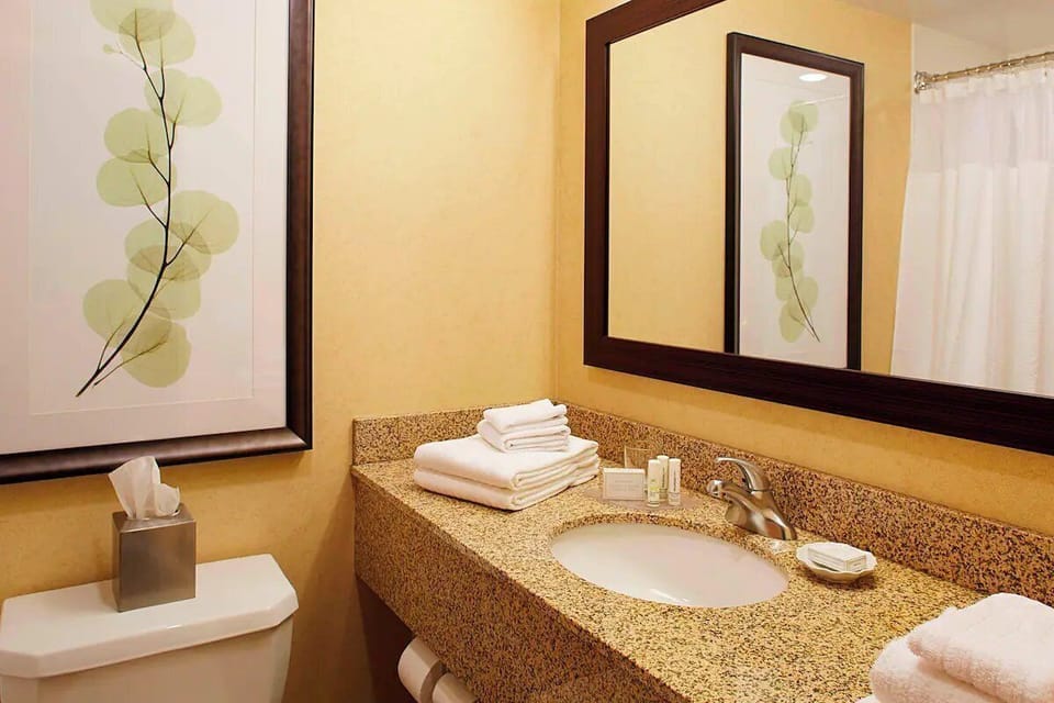 Refresh each morning with a spotless vanity and fresh towels.