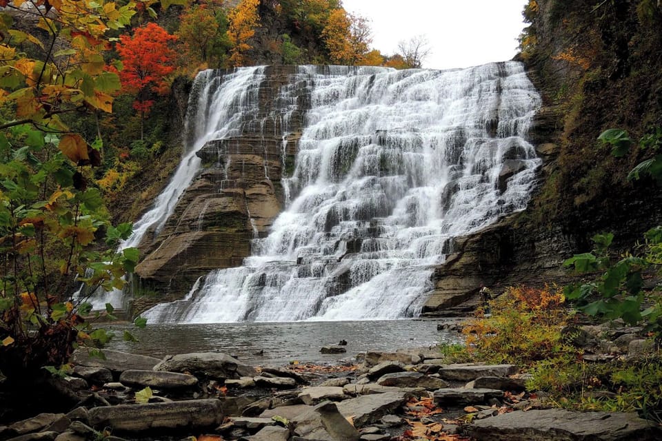 Explore a beautiful nearby waterfall escape surrounded by autumn colors.