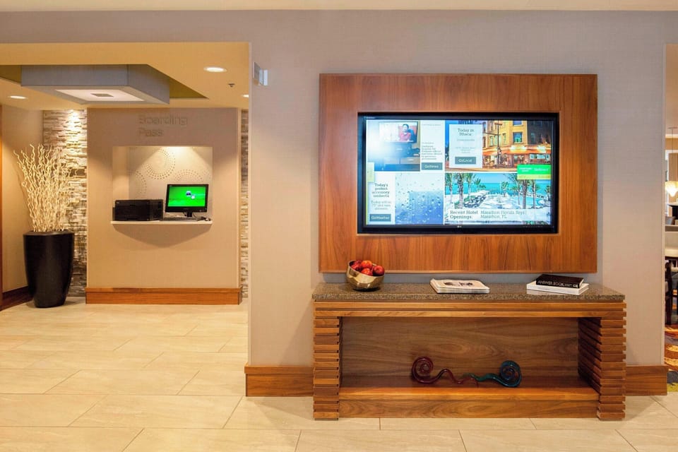 Settle in with cozy seating and a stylish media wall.