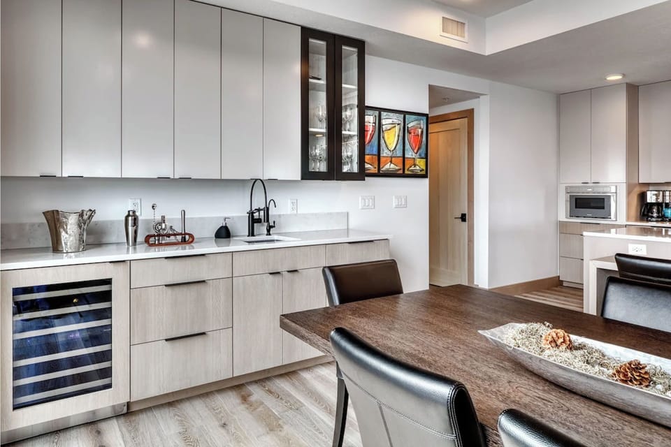 Bar area includes a Thermador undercounted wine refrigerator.