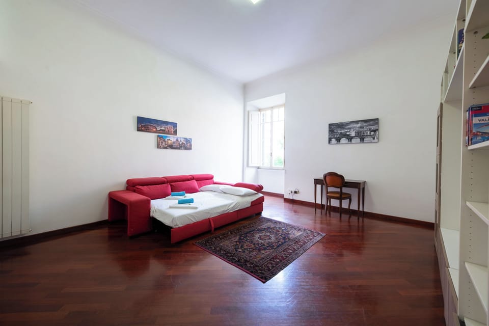 Apartment (1 Bedroom) | Living area | 32-inch Smart TV with cable channels
