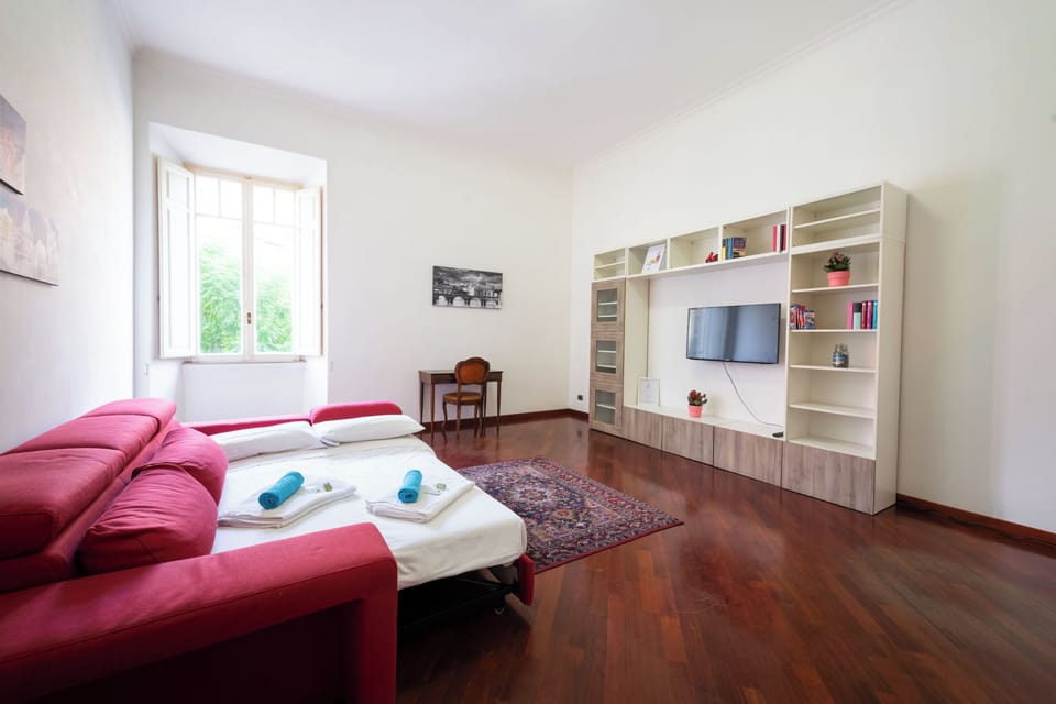 Apartment (1 Bedroom) | Living area | 32-inch Smart TV with cable channels