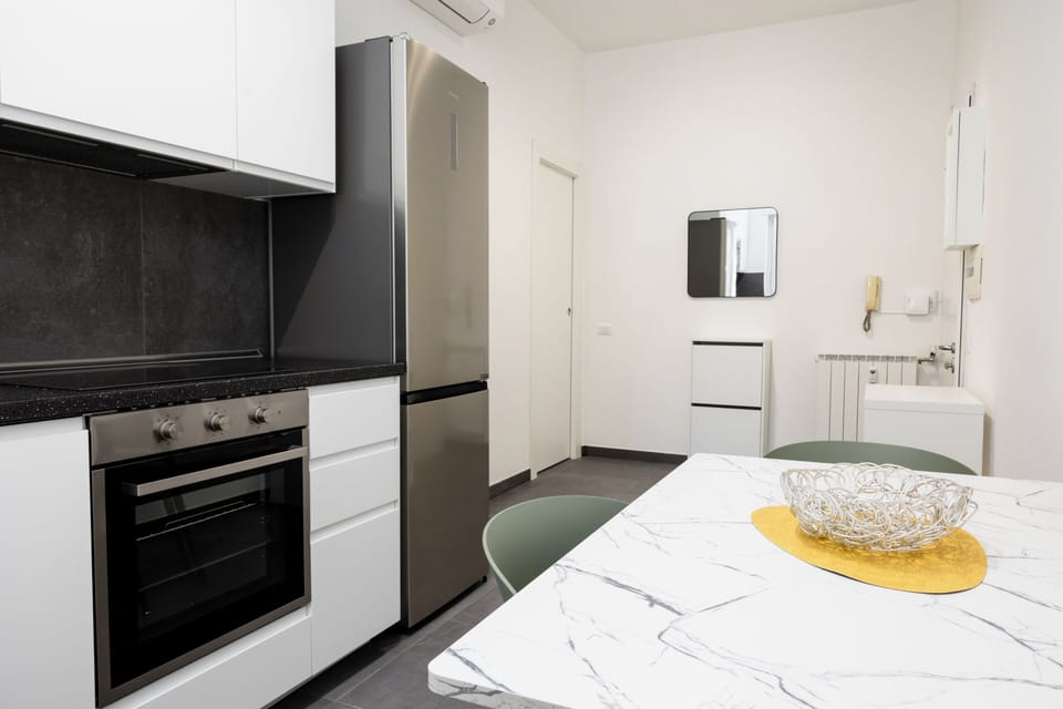 Apartment (1 Bedroom) | Private kitchen | Espresso maker, stovetop, electric kettle, cookware/dishes/utensils