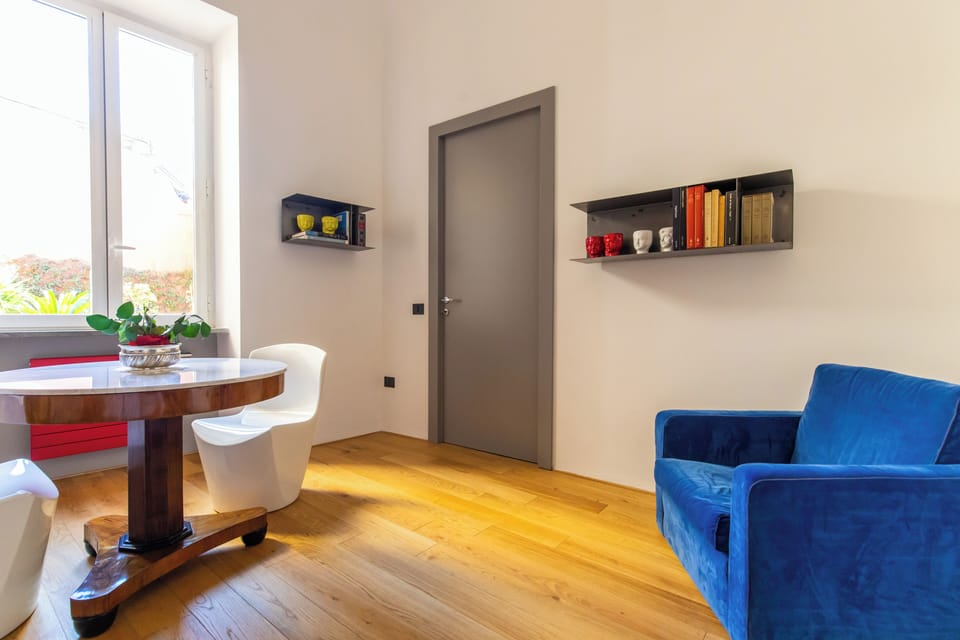 Design Room (1 Bedroom) | Living area | 32-inch Smart TV with cable channels