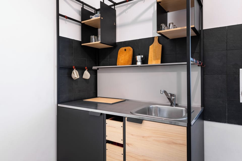 Apartment (1 Bedroom) | Private kitchen | Microwave, stovetop, electric kettle, cookware/dishes/utensils