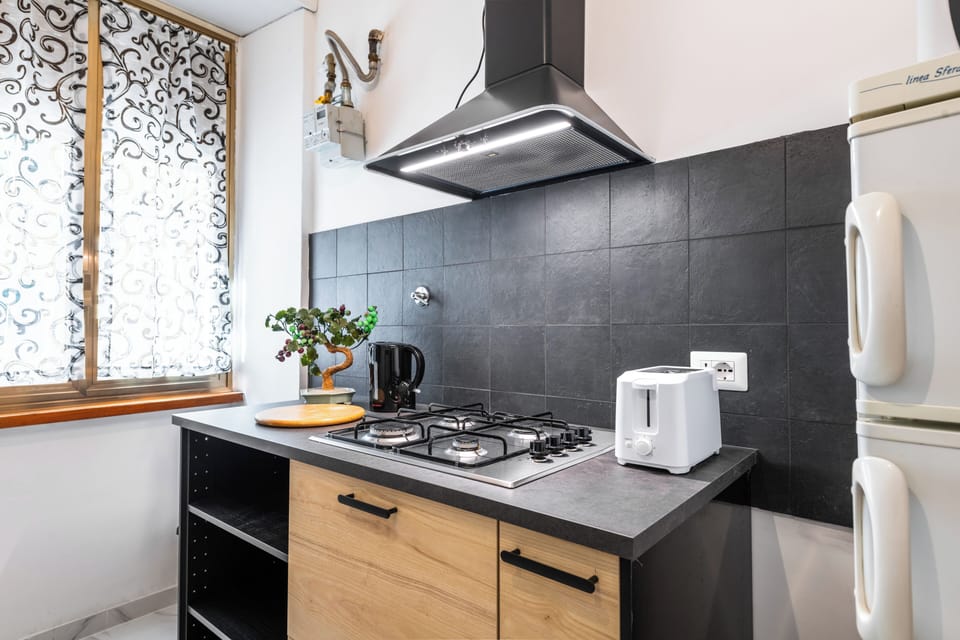 Apartment (1 Bedroom) | Private kitchen | Microwave, stovetop, electric kettle, cookware/dishes/utensils
