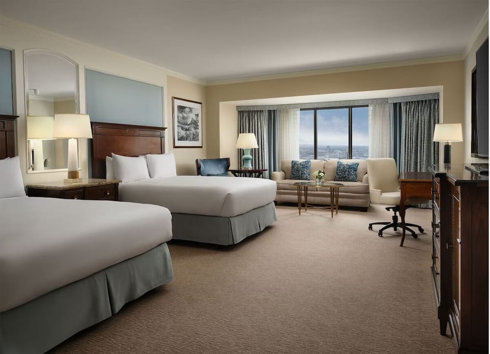 Wake refreshed in a spacious room with calming city views.