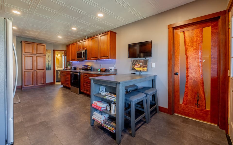 The well equipped and spacious kitchen