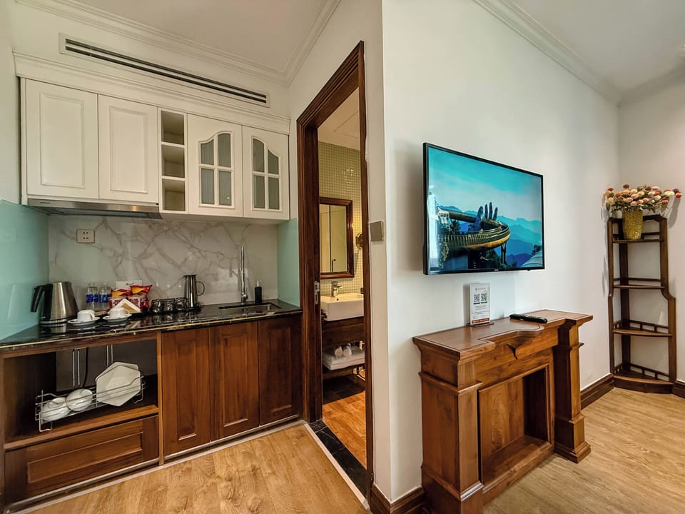 Deluxe Double Room, River View | Minibar, desk, laptop workspace, blackout drapes