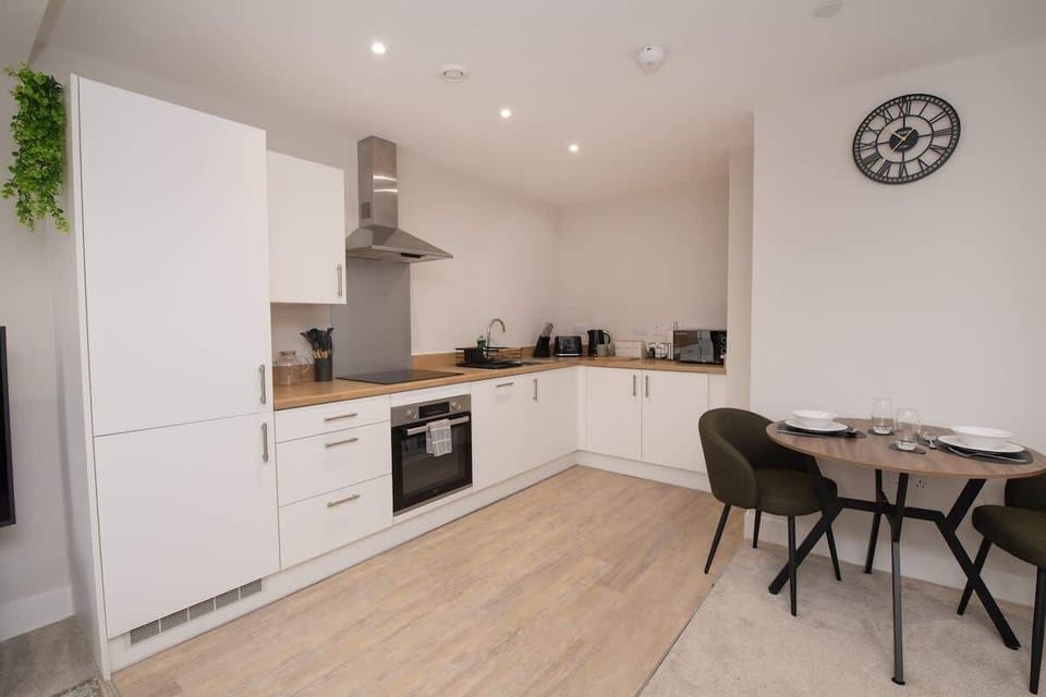 Our kitchen is fully equipped with a cooker, toaster, kettle, and plenty of cooking essentials—perfect for preparing hearty breakfasts or relaxed evening meals. The space is open-plan, flowing seamlessly into the living room and dining area.