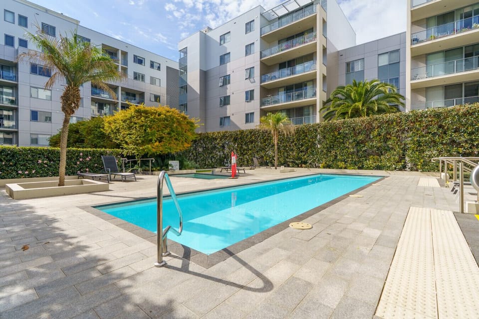 Take a refreshing dip in the sparkling shared pool and enjoy resort-style living.