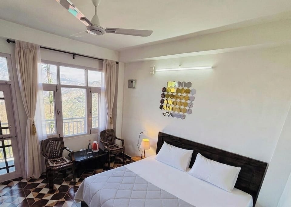 Family Double Room, Balcony, Mountain View | In-room safe, desk, laptop workspace, iron/ironing board