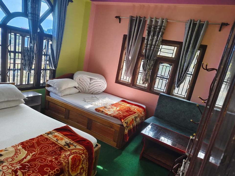 Deluxe Quadruple Room, Balcony | Desk, free WiFi