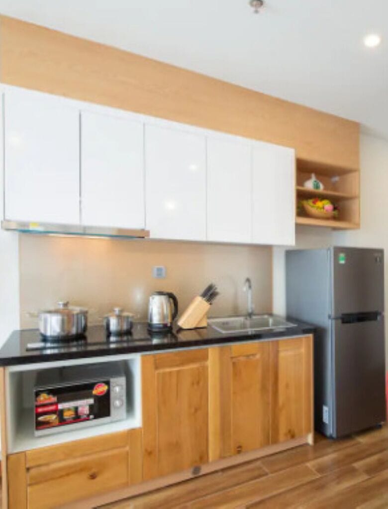Studio, Balcony | Private kitchen | Fridge, microwave, cookware/dishes/utensils, dining table