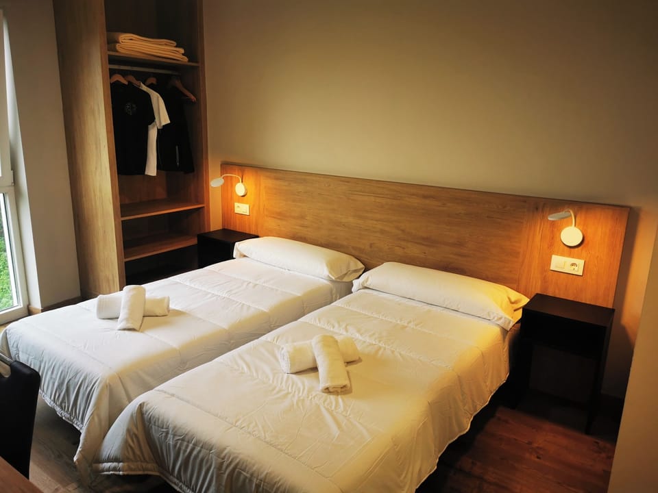 Down comforters, desk, free WiFi, bed sheets