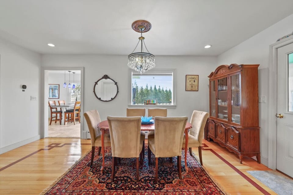 Gather around the table under soft lighting for relaxed dinners at home.