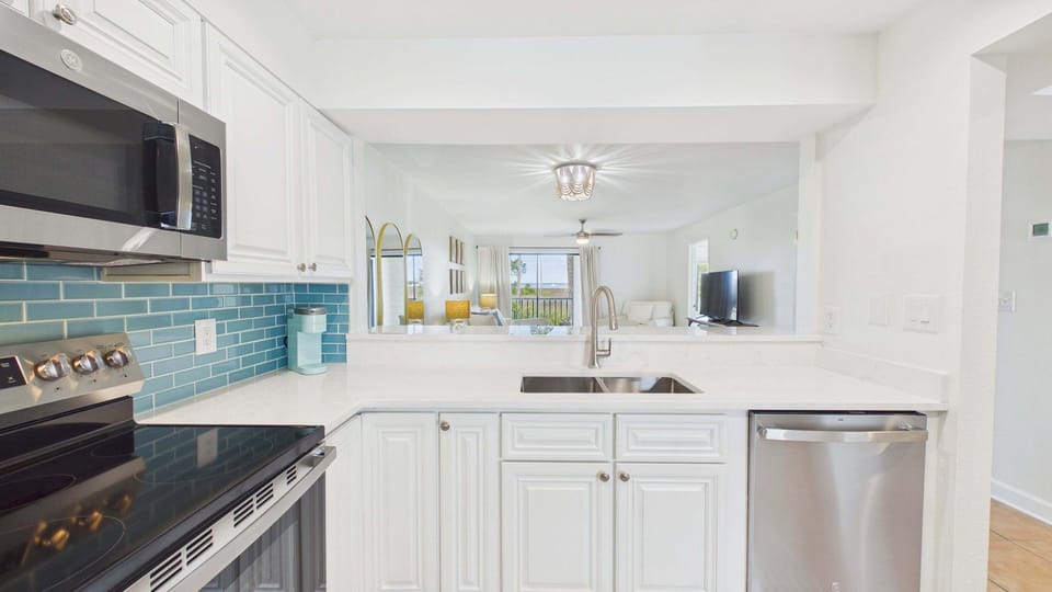 Full kitchen with stainless appliances and all the cooking essentials