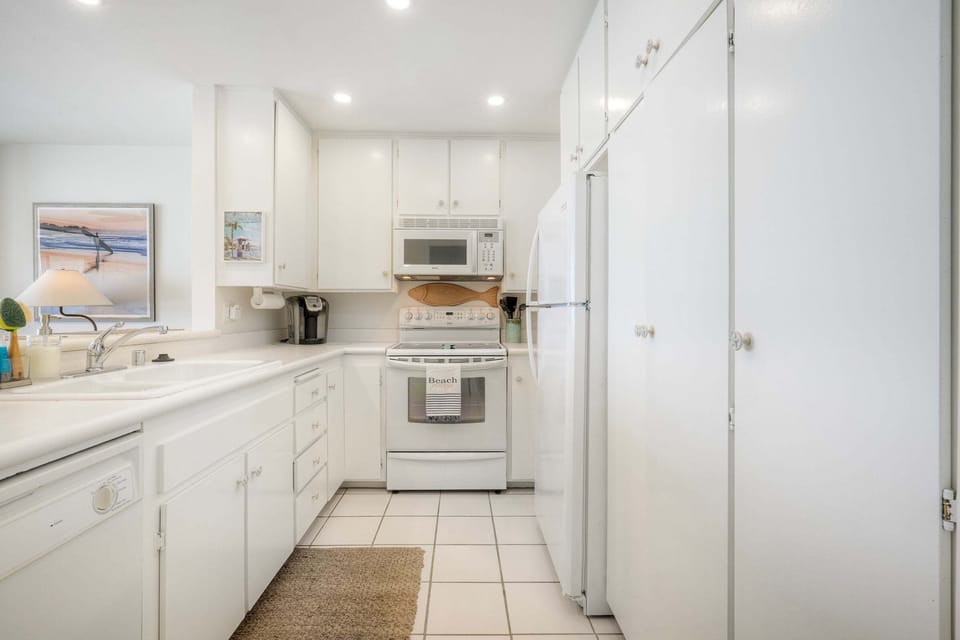 Spacious kitchen with full appliances.